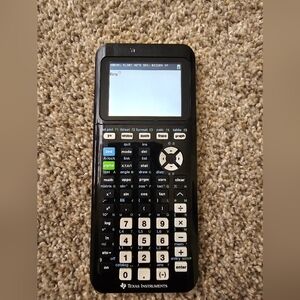 TI Graphing Calculator in Black with White Keys